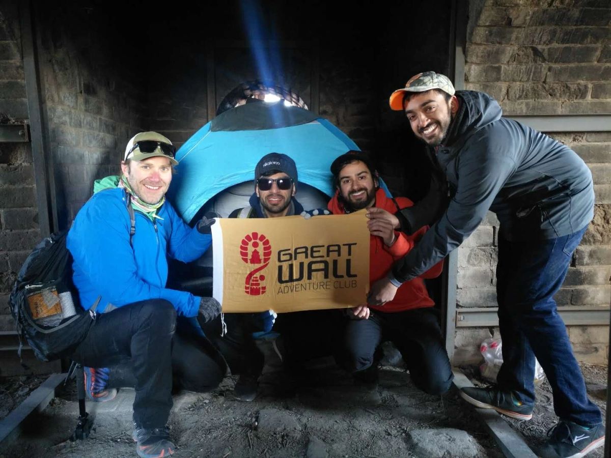Guests camping on the Great Wall, from Great Wall Adventure Club’s original feature