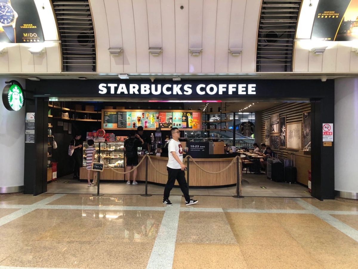 Meet the driver in front of Starbucks Coffee.