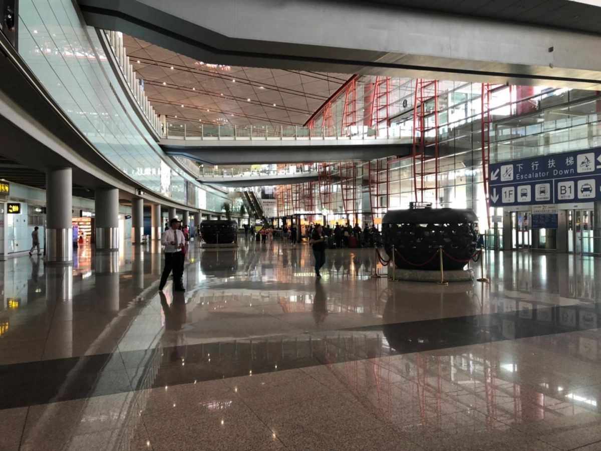 Continue into the Terminal 3 arrivals hall.
