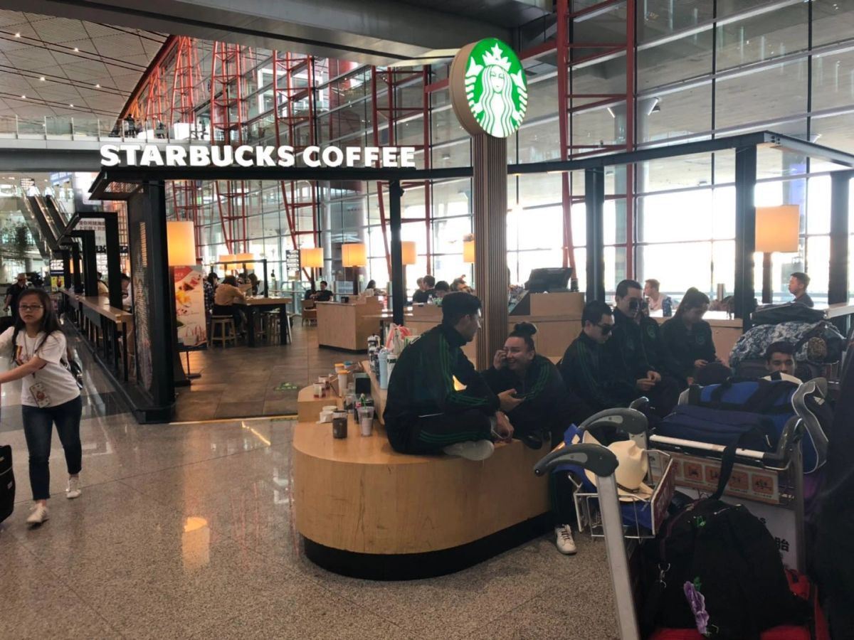 Turn left to the larger Starbucks Coffee Island.